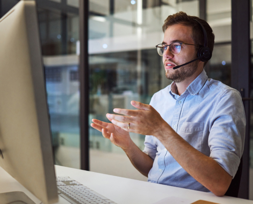IT support worker talking with headset